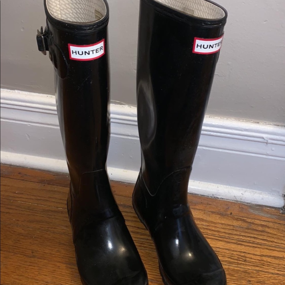 Tall glossy Hunter rain boots